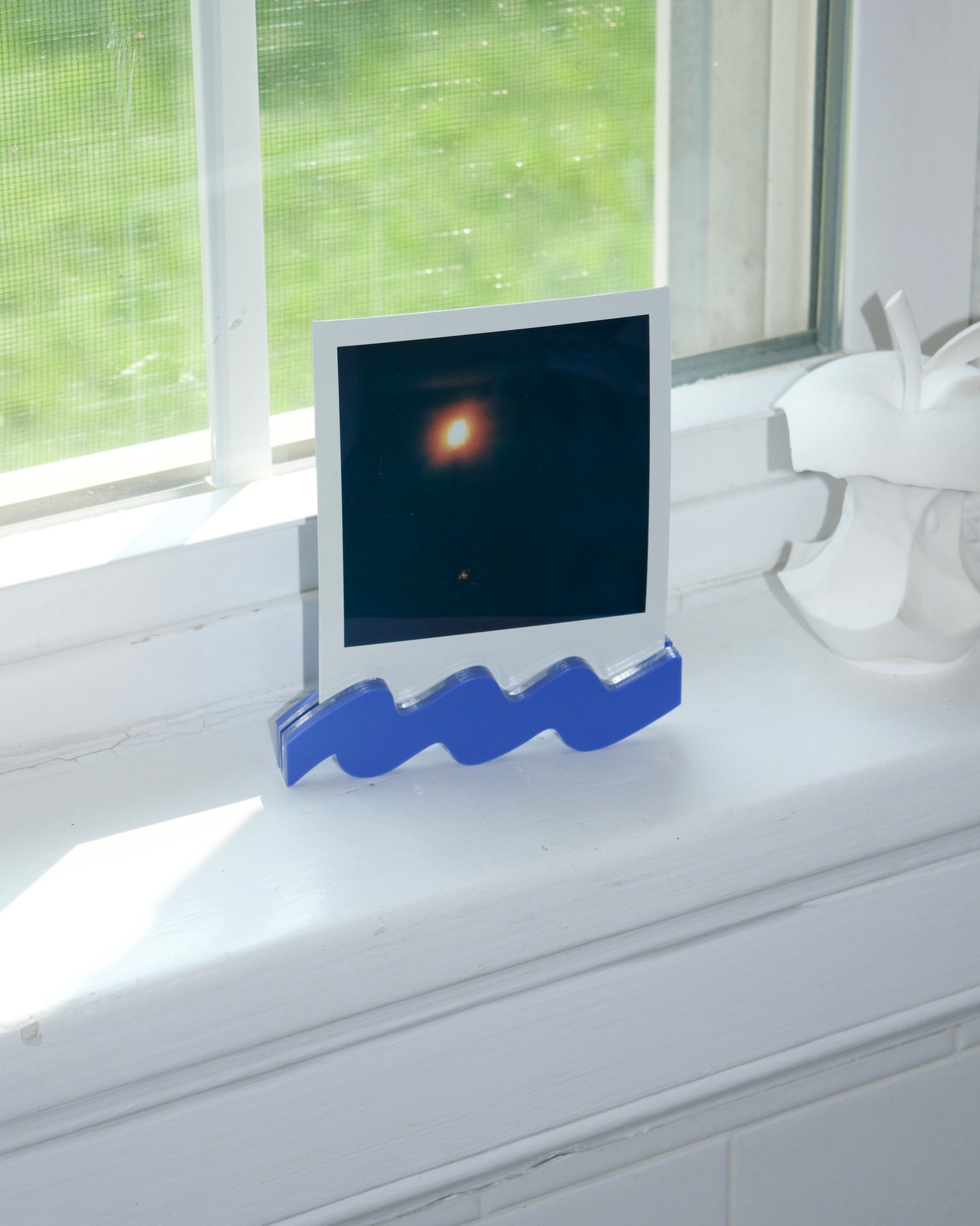 polaroid squiggle stand | primary collection