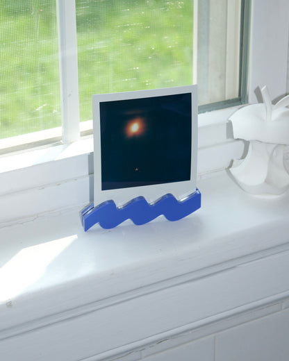 polaroid squiggle stand | primary collection