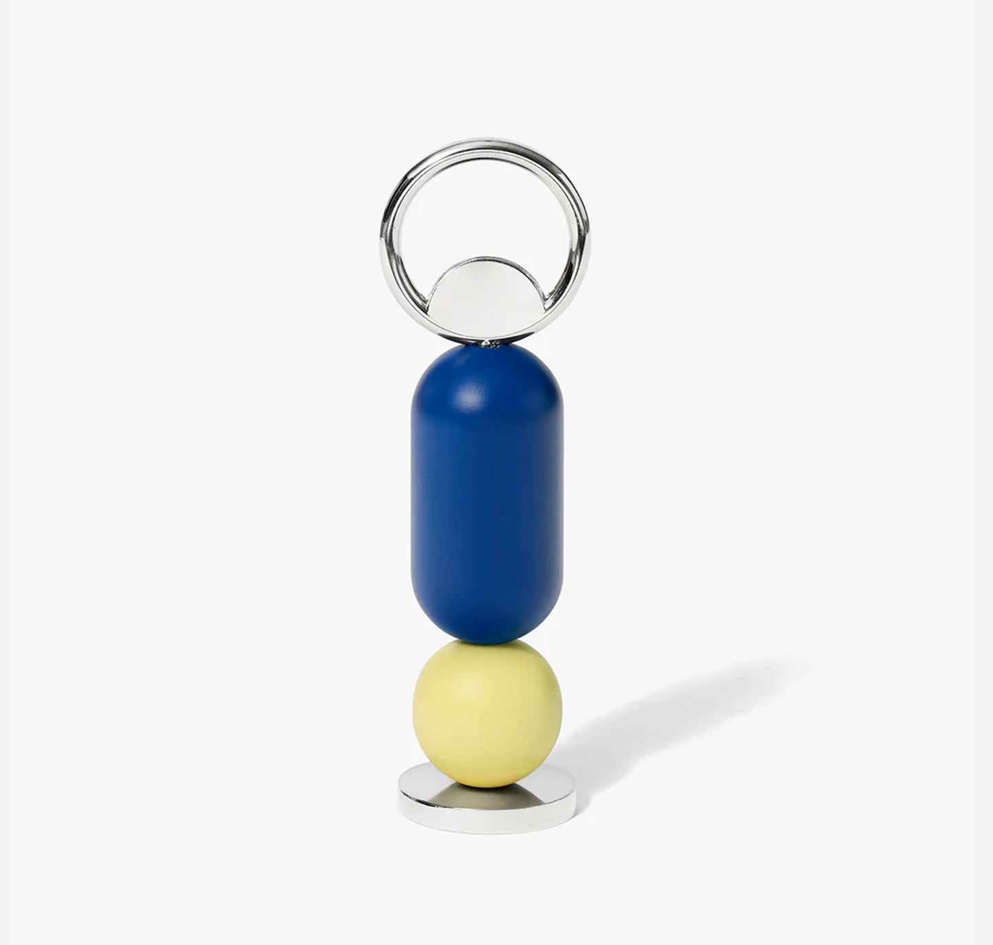 Bottle opener with blue and yellow beads on a white background