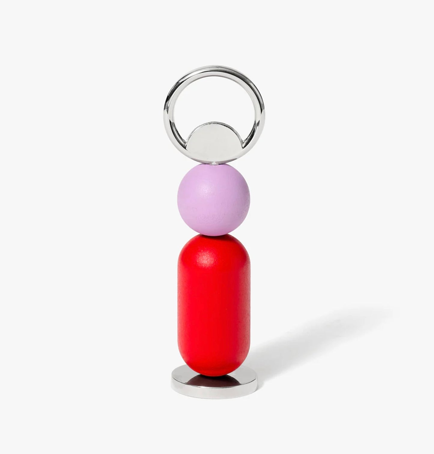 Bottle opener with a red cylindrical and purple spherical design on a white background
