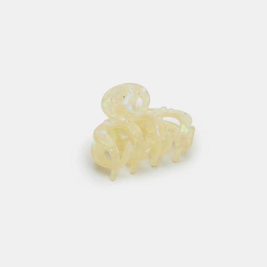 Clear plastic hair claw on a white background