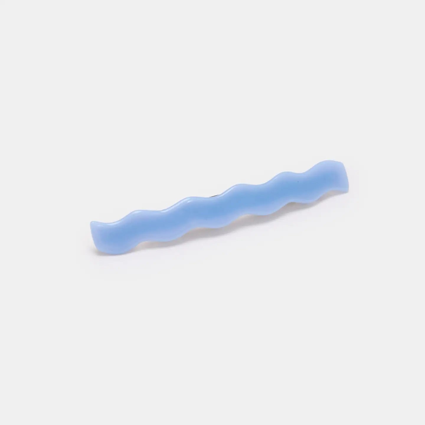Blue wavy barrette  on a white background